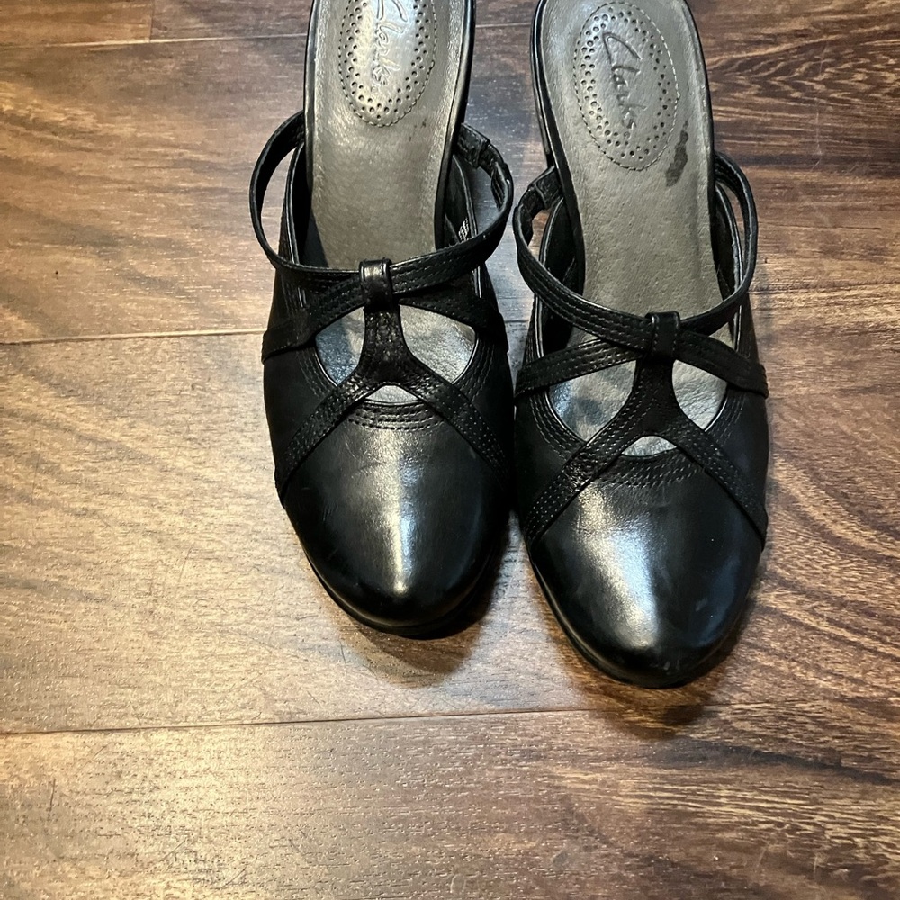 Clarks Black Leather Mules with Decorative Cut-Outs